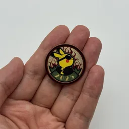 In hand, from Pokémon Coin Fan, full size