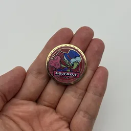 In hand, from Pokémon Coin Fan, full size