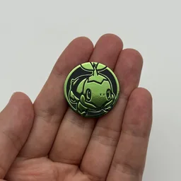 In hand, from Pokémon Coin Fan, full size
