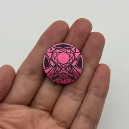 In hand, from Pokémon Coin Fan, full size