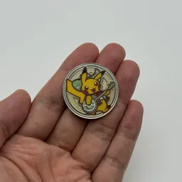 In hand, from Pokémon Coin Fan, full size