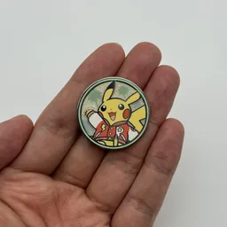 In hand, from Pokémon Coin Fan, full size