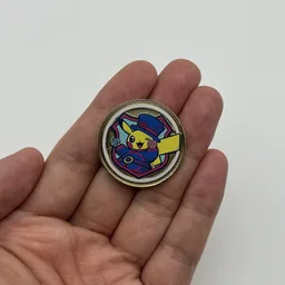 In hand, from Pokémon Coin Fan, full size