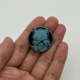 In hand, from Pokémon Coin Fan, full size