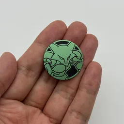 In hand, from Pokémon Coin Fan, full size