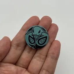 In hand, from Pokémon Coin Fan, full size