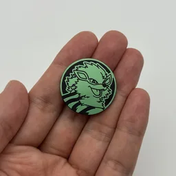 In hand, from Pokémon Coin Fan, full size