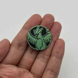 In hand, from Pokémon Coin Fan, full size