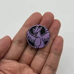 In hand, from Pokémon Coin Fan, full size