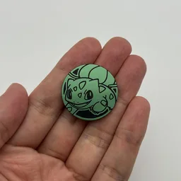 In hand, from Pokémon Coin Fan, full size