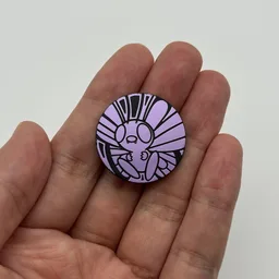 In hand, from Pokémon Coin Fan, full size
