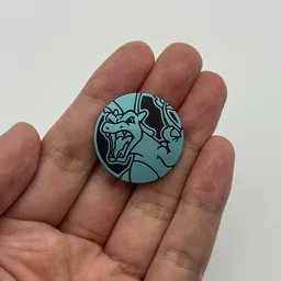 In hand, from Pokémon Coin Fan, full size