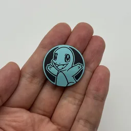 In hand, from Pokémon Coin Fan, full size