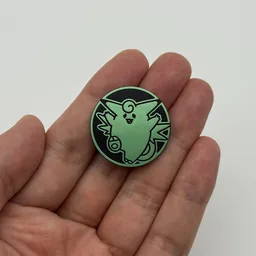 In hand, from Pokémon Coin Fan, full size