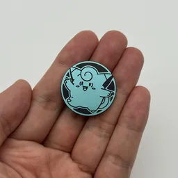 In hand, from Pokémon Coin Fan, full size