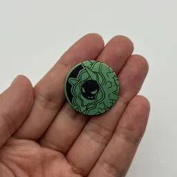 In hand, from Pokémon Coin Fan, full size