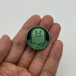 In hand, from Pokémon Coin Fan, full size