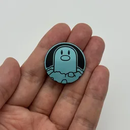 In hand, from Pokémon Coin Fan, full size
