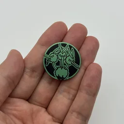 In hand, from Pokémon Coin Fan, full size