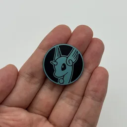 In hand, from Pokémon Coin Fan, full size