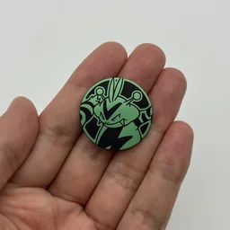 In hand, from Pokémon Coin Fan, full size