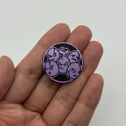 In hand, from Pokémon Coin Fan, full size