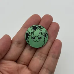 In hand, from Pokémon Coin Fan, full size