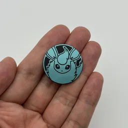 In hand, from Pokémon Coin Fan, full size