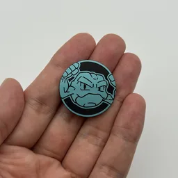 In hand, from Pokémon Coin Fan, full size