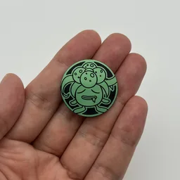 In hand, from Pokémon Coin Fan, full size
