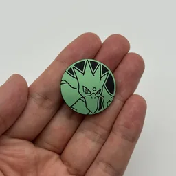 In hand, from Pokémon Coin Fan, full size