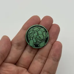 In hand, from Pokémon Coin Fan, full size