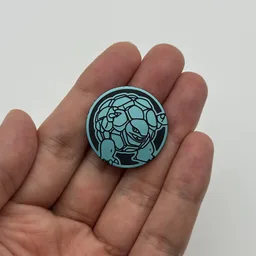 In hand, from Pokémon Coin Fan, full size