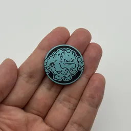 In hand, from Pokémon Coin Fan, full size