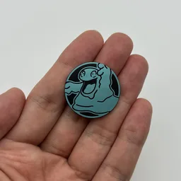 In hand, from Pokémon Coin Fan, full size
