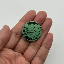 In hand, from Pokémon Coin Fan, full size