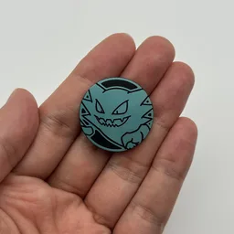 In hand, from Pokémon Coin Fan, full size