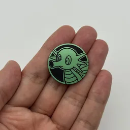 In hand, from Pokémon Coin Fan, full size