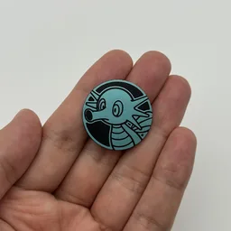 In hand, from Pokémon Coin Fan, full size