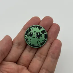 In hand, from Pokémon Coin Fan, full size