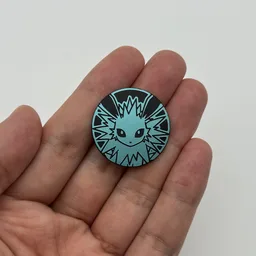 In hand, from Pokémon Coin Fan, full size