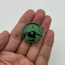 In hand, from Pokémon Coin Fan, full size