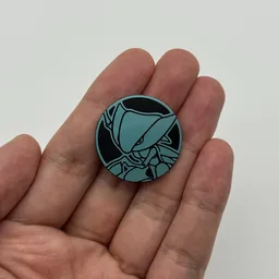 In hand, from Pokémon Coin Fan, full size