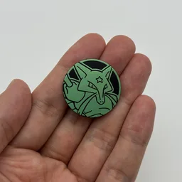 In hand, from Pokémon Coin Fan, full size