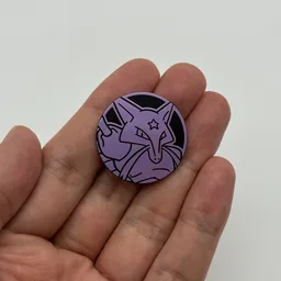 In hand, from Pokémon Coin Fan, full size