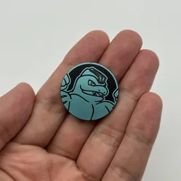 In hand, from Pokémon Coin Fan, full size