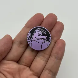 In hand, from Pokémon Coin Fan, full size