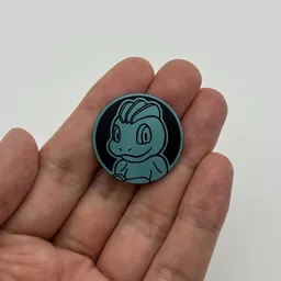 In hand, from Pokémon Coin Fan, full size