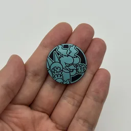 In hand, from Pokémon Coin Fan, full size