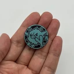 In hand, from Pokémon Coin Fan, full size
